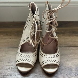 Restricted helmed lace up booties